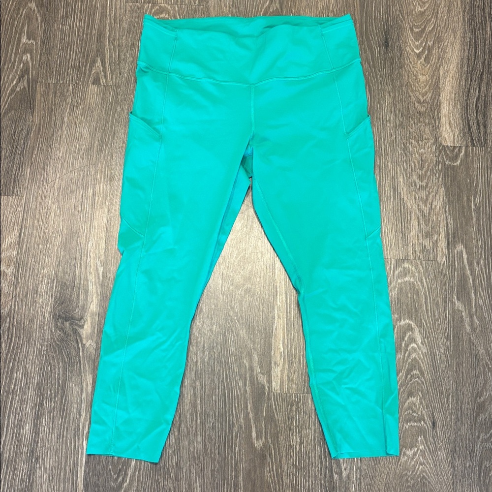 Lululemon Teal High-Rise Leggings with Side Pockets 23” , size 14